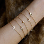 SEO TITLE

Mini Hamsa Bracelet – 14K Gold Protection Bracelet | Ruby Star Studio

META TITLE

Mini Hamsa Bracelet | 14K Gold Hand of God Protection Bracelet | Ruby Star Studio

META DESCRIPTION

A miniature Hamsa bracelet handcrafted in 14K gold. A powerful symbol of protection, strength, peace and good fortune, designed for everyday wear.

MINI HAMSA BRACELET

A protective symbol worn close to the skin.

The Mini Hamsa Bracelet is handcrafted in solid 14K gold and features the iconic Hamsa hand — an ancien