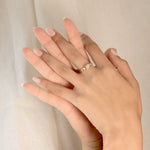 ARISE RING
An Art Deco-inspired architectural engagement ring where geometry and elegance merge. The emerald-cut diamond is framed with precision and clarity.
The ARISE RING is a 14K solid gold Fine Jewelry engagement ring designed with sculptural restraint and timeless sophistication.
Handcrafted in the Ruby Star studio as a modern heirloom.
Details:
• 0.45ct emerald-cut diamond
• Architectural bezel setting
• 14K solid gold
• Handmade fine jewelry
• Art Deco influence
A luxury emerald-cut engagement ring 