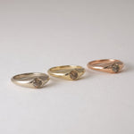 Our modern interpretation of the classic gypsy ring - soft, flowing curves with just the right amount of volume. A perfect balance of simplicity and refinement, bold yet effortless and timeless, seamlessly blending femininity and masculinity.&nbsp;

Petit Oro is set with a 0.25ct diamond of choice. Available in Natural white, Lab or champagne

Each champagne diamond is one of a kind in color, varying in a range of hues between light champagne to light brown. Therefore allow slight color variation after choo