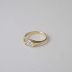 A teardrop-shaped diamond ring that captures natural movement through soft, fluid geometry. The pear-cut diamond blends marquise and oval influences, creating a silhouette that feels both delicate and powerful.
The DIAMOND DROP II is a 14K solid gold Fine Jewelry engagement ring, handcrafted in the Ruby Star studio. It represents contemporary luxury jewelry at its most refined—minimal, organic, and quietly expressive.
Designed as a modern heirloom, this piece balances comfort, elegance, and sculptural clari