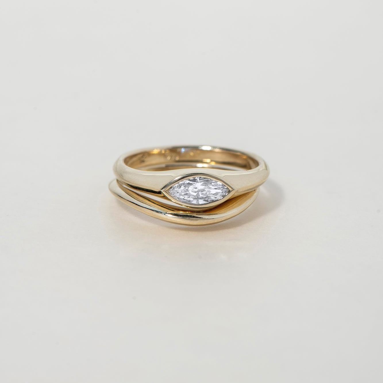 FAY RING
A minimalist signet-style engagement ring where the marquise diamond becomes part of a seamless gold structure.
The FAY RING is a 14K solid gold Fine Jewelry piece that embodies softness, strength, and sculptural clarity.
Handcrafted in the Ruby Star studio as a modern heirloom engagement ring.
Details:
• 0.40ct marquise diamond (natural or lab-grown)
• Bezel setting
• 14K solid gold
• Handmade fine jewelry
• Minimal sculptural design
A luxury engagement ring for those drawn to clean lines and time