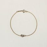 SEO TITLE

Mini Hamsa Bracelet – 14K Gold Protection Bracelet | Ruby Star Studio

META TITLE

Mini Hamsa Bracelet | 14K Gold Hand of God Protection Bracelet | Ruby Star Studio

META DESCRIPTION

A miniature Hamsa bracelet handcrafted in 14K gold. A powerful symbol of protection, strength, peace and good fortune, designed for everyday wear.

MINI HAMSA BRACELET

A protective symbol worn close to the skin.

The Mini Hamsa Bracelet is handcrafted in solid 14K gold and features the iconic Hamsa hand — an ancien