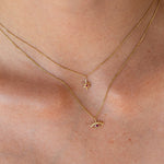 SEO TITLE

Mini Star Necklace – 14K Gold North Star Necklace | Ruby Star Studio

META TITLE

Mini Star Necklace | 14K Gold Guiding Star Necklace | Ruby Star Studio

META DESCRIPTION

A miniature North Star necklace handcrafted in 14K gold. A symbol of direction, purpose and guidance, available with a white diamond, black diamond or ruby.

MINI STAR NECKLACE

A guiding light, worn close to the heart.

The Mini Star Necklace is handcrafted in solid 14K gold and inspired by the North Star — the celestial landm