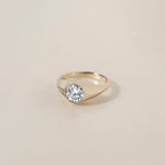 GRAND ORO
A modern interpretation of the gypsy ring, defined by soft volume and sculptural balance. The flush-set diamond becomes one with the gold, creating a monolithic and effortless silhouette.
The GRAND ORO is a 14K solid gold Fine Jewelry engagement ring that blends tradition with contemporary luxury design. Bold yet minimal, soft yet structured.
Handcrafted in the Ruby Star studio, it is designed as a modern heirloom piece that transcends trends.
Details:
• 1ct diamond (white / lab-grown / champagne)