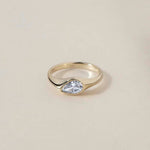 A teardrop-shaped diamond ring that captures natural movement through soft, fluid geometry. The pear-cut diamond blends marquise and oval influences, creating a silhouette that feels both delicate and powerful.
The DIAMOND DROP II is a 14K solid gold Fine Jewelry engagement ring, handcrafted in the Ruby Star studio. It represents contemporary luxury jewelry at its most refined—minimal, organic, and quietly expressive.
Designed as a modern heirloom, this piece balances comfort, elegance, and sculptural clari