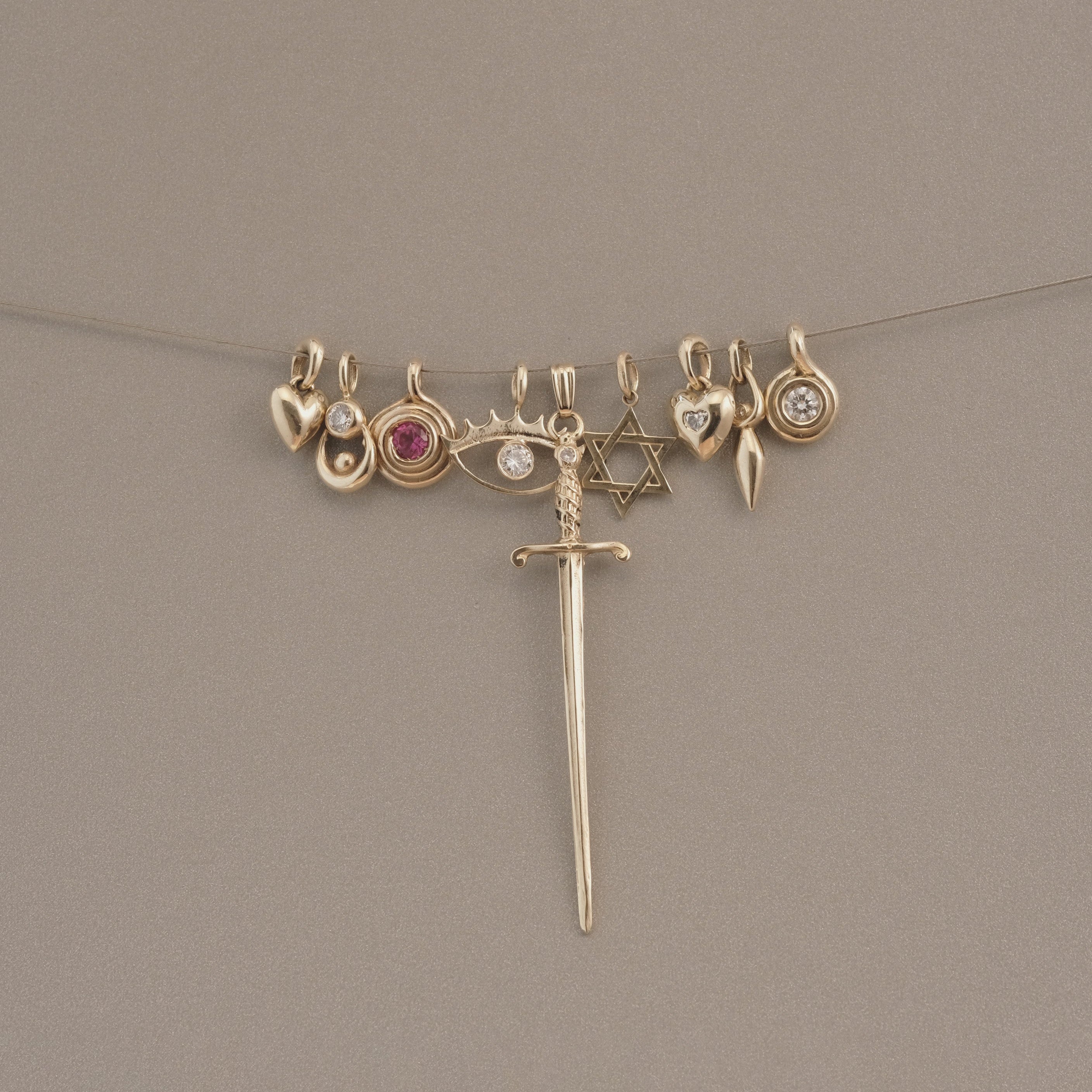 GOLD SWORD PENDANT - Ruby Star
