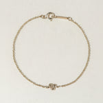 A miniature snake bracelet handcrafted in 14K solid gold. Delicate yet symbolic, it is a quiet expression of transformation, balancing sculptural simplicity with meaningful design.

Throughout history, snakes have represented fertility, creative life force, and renewal. As snakes shed their skin to survive, they remind us of our own ability to release, evolve, and begin again. They are enduring symbols of healing, rebirth, and personal transformation.

The MINI SNAKE BRACELET is a handcrafted Fine Jewelry p