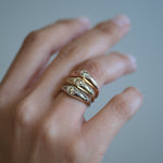 Our modern interpretation of the classic gypsy ring - soft, flowing curves with just the right amount of volume. A perfect balance of simplicity and refinement, bold yet effortless and timeless, seamlessly blending femininity and masculinity.&nbsp;

Petit Oro is set with a 0.25ct diamond of choice. Available in Natural white, Lab or champagne

Each champagne diamond is one of a kind in color, varying in a range of hues between light champagne to light brown. Therefore allow slight color variation after choo