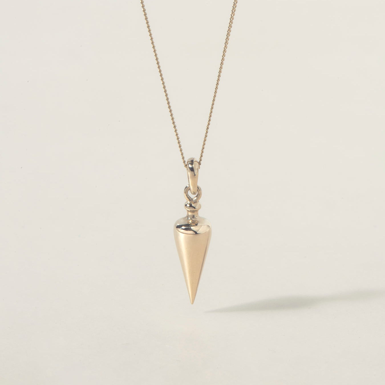 AXIS PENDULUM NECKLACE - Ruby Star