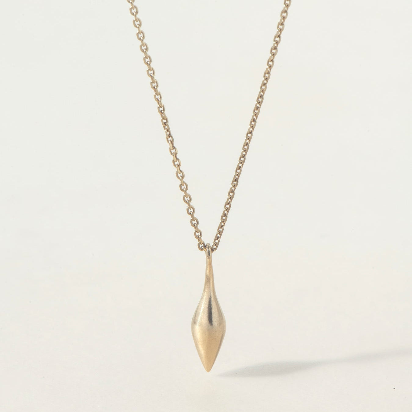 ECHO PENDULUM NECKLACE - Ruby Star