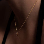 MINI VASE NECKLACE

A miniature vessel necklace handcrafted in 14K solid gold and suspended from a delicate curb chain. Small in scale yet rich in symbolism, it is a sculptural object that balances softness, femininity, and quiet presence.

Throughout history, the vessel has been a feminine, mystical, and ceremonial symbol. In biblical tradition, a vessel represents a person chosen to carry purpose and meaning. At its essence, the vessel symbolizes the human body—particularly the female body that ho