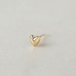 SEO TITLE

Mini Heart Stud – 14K Gold Heart Earring | Ruby Star Studio

META TITLE

Mini Heart Stud | 14K Gold Symbolic Earring | Ruby Star Studio

META DESCRIPTION

A miniature 14K gold heart stud symbolizing love, compassion and emotional wisdom. Handcrafted fine jewelry designed for everyday wear.

MINI HEART STUD

A tiny heart with enduring meaning.

The Mini Heart Stud is handcrafted in solid 14K gold and designed as a delicate everyday talisman. Measuring just 5.5 mm, this miniature heart carries one 