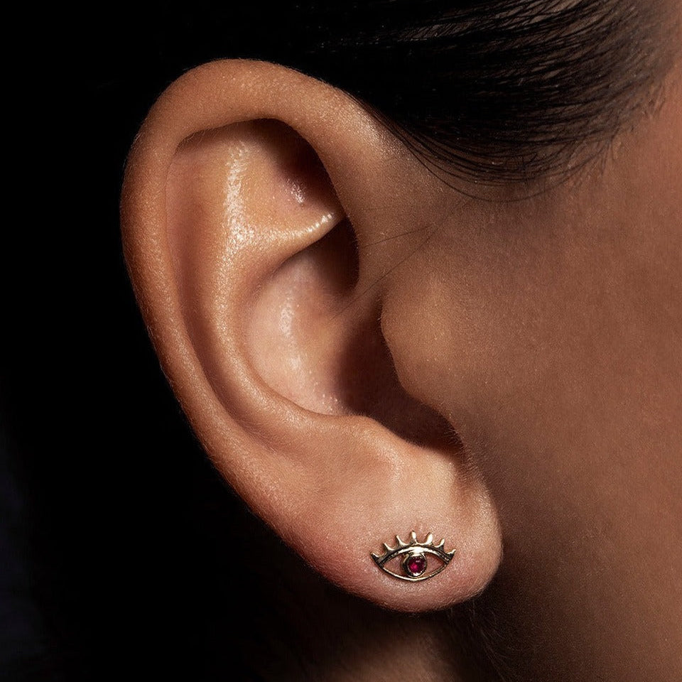 A miniature eye crafted in 14K solid gold. Delicate in scale yet rich in symbolism, it is a quiet object that bridges the visible and the unseen, balancing sculptural simplicity with meaningful design.

The symbolism of the eye has existed for thousands of years and is deeply associated with consciousness and awareness. The Evil Eye is worn for protection, the All-Seeing Eye represents divine providence, and the Third Eye symbolizes intuition, inner wisdom, and enlightenment.

The eye is a bridge between th