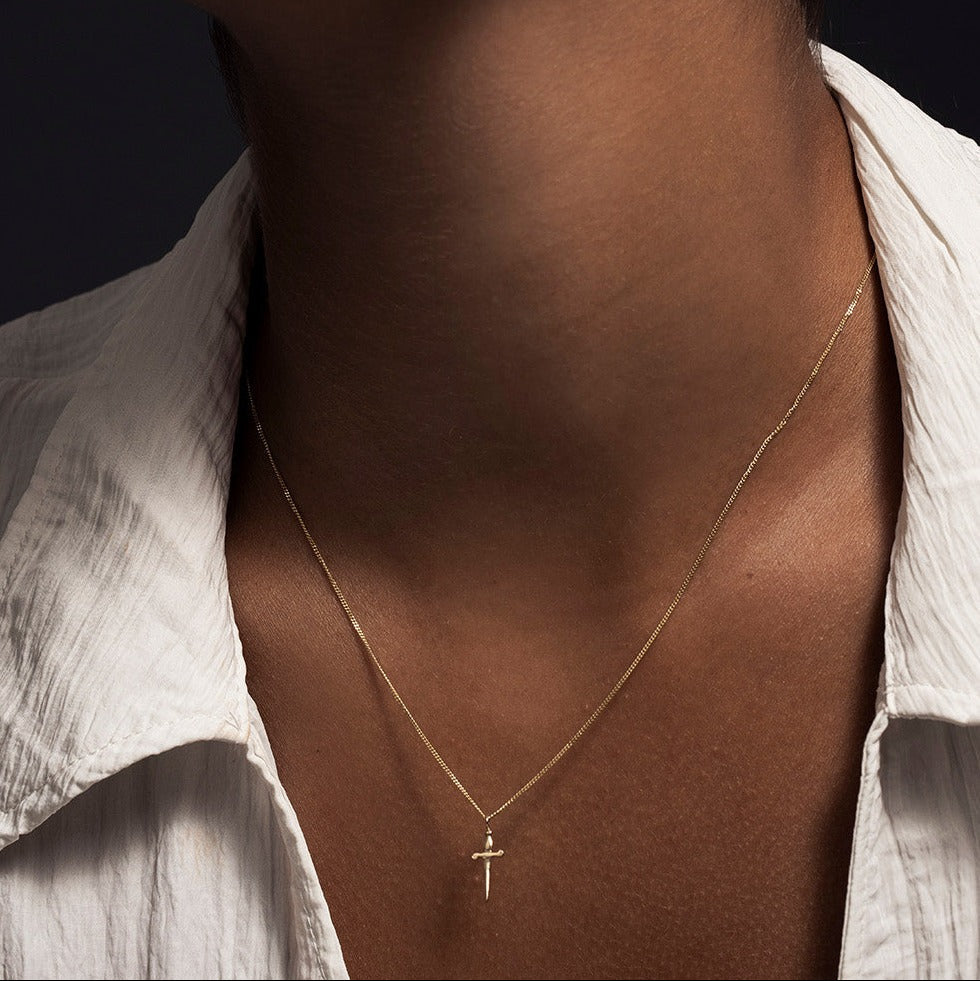 SEO TITLE

Mini Sword Necklace – 14K Gold Protection & Manifestation Necklace | Ruby Star Studio

META TITLE

Mini Sword Necklace | 14K Gold Sword Pendant Necklace | Ruby Star Studio

META DESCRIPTION

A miniature sword necklace handcrafted in 14K gold. A symbol of courage, protection, clarity and manifestation. A powerful modern talisman by Ruby Star Studio.

MINI SWORD NECKLACE

A symbol of courage, clarity and inner strength.

The Mini Sword Necklace is handcrafted in solid 14K gold and designed as a min