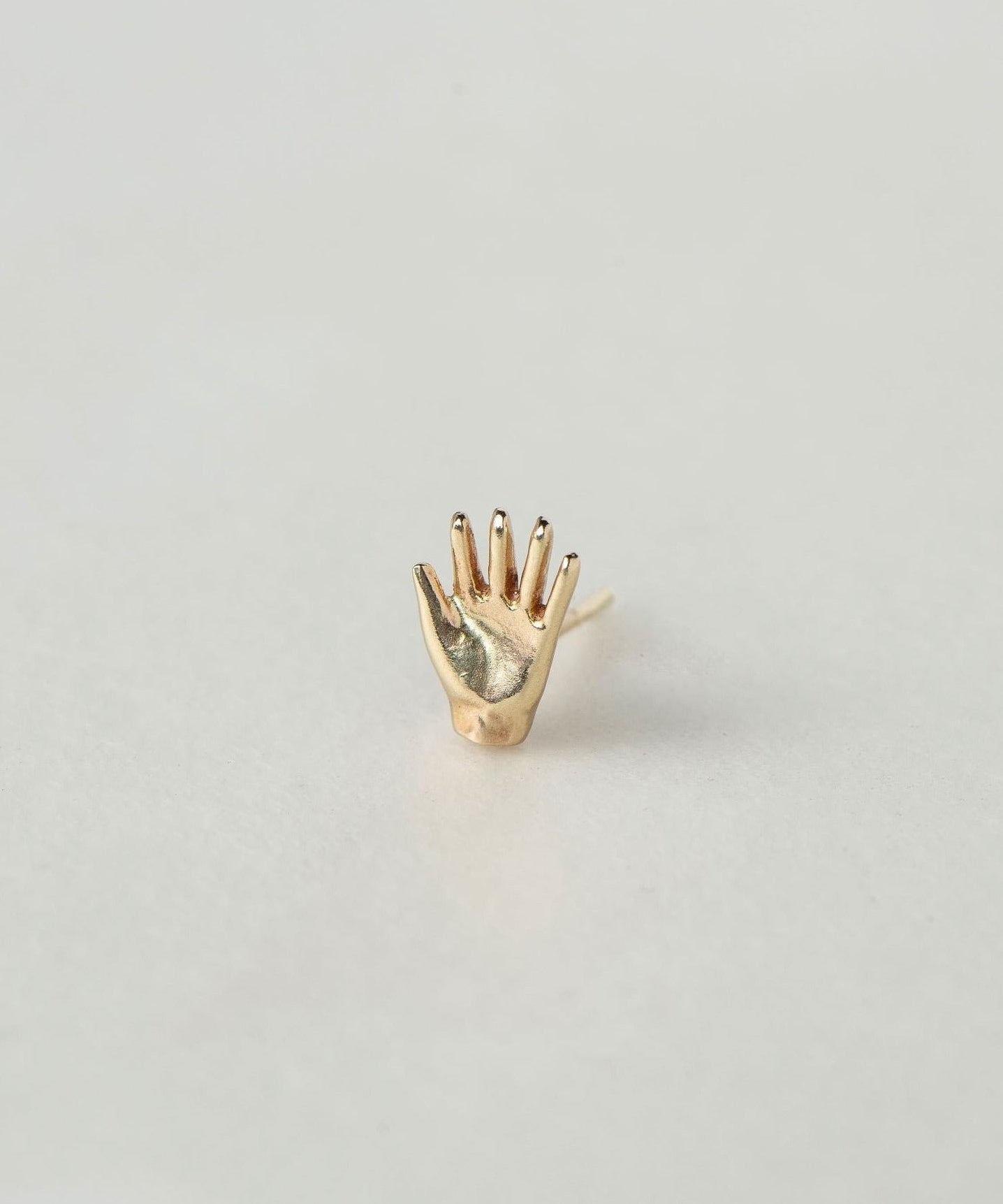 SEO TITLE

Mini Hand Stud – 14K Gold Hamsa Stud Earring | Ruby Star Studio

META TITLE

Mini Hand Stud | 14K Gold Hamsa Protection Earring | Ruby Star Studio

META DESCRIPTION

A miniature Hamsa hand stud handcrafted in 14K gold. A symbol of protection, strength, generosity and good fortune. A timeless everyday talisman.

MINI HAND STUD

A small talisman of protection, strength and blessing.

The Mini Hand Stud is handcrafted in solid 14K gold and inspired by the ancient Hamsa — also known as the Hand of Go