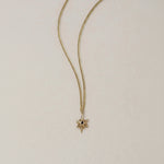 SEO TITLE

Mini Star Necklace – 14K Gold North Star Necklace | Ruby Star Studio

META TITLE

Mini Star Necklace | 14K Gold Guiding Star Necklace | Ruby Star Studio

META DESCRIPTION

A miniature North Star necklace handcrafted in 14K gold. A symbol of direction, purpose and guidance, available with a white diamond, black diamond or ruby.

MINI STAR NECKLACE

A guiding light, worn close to the heart.

The Mini Star Necklace is handcrafted in solid 14K gold and inspired by the North Star — the celestial landm