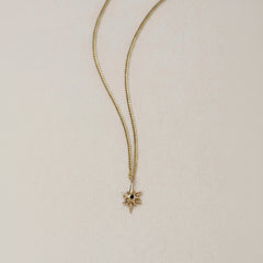 SEO TITLE

Mini Star Necklace – 14K Gold North Star Necklace | Ruby Star Studio

META TITLE

Mini Star Necklace | 14K Gold Guiding Star Necklace | Ruby Star Studio

META DESCRIPTION

A miniature North Star necklace handcrafted in 14K gold. A symbol of direction, purpose and guidance, available with a white diamond, black diamond or ruby.

MINI STAR NECKLACE

A guiding light, worn close to the heart.

The Mini Star Necklace is handcrafted in solid 14K gold and inspired by the North Star — the celestial landm