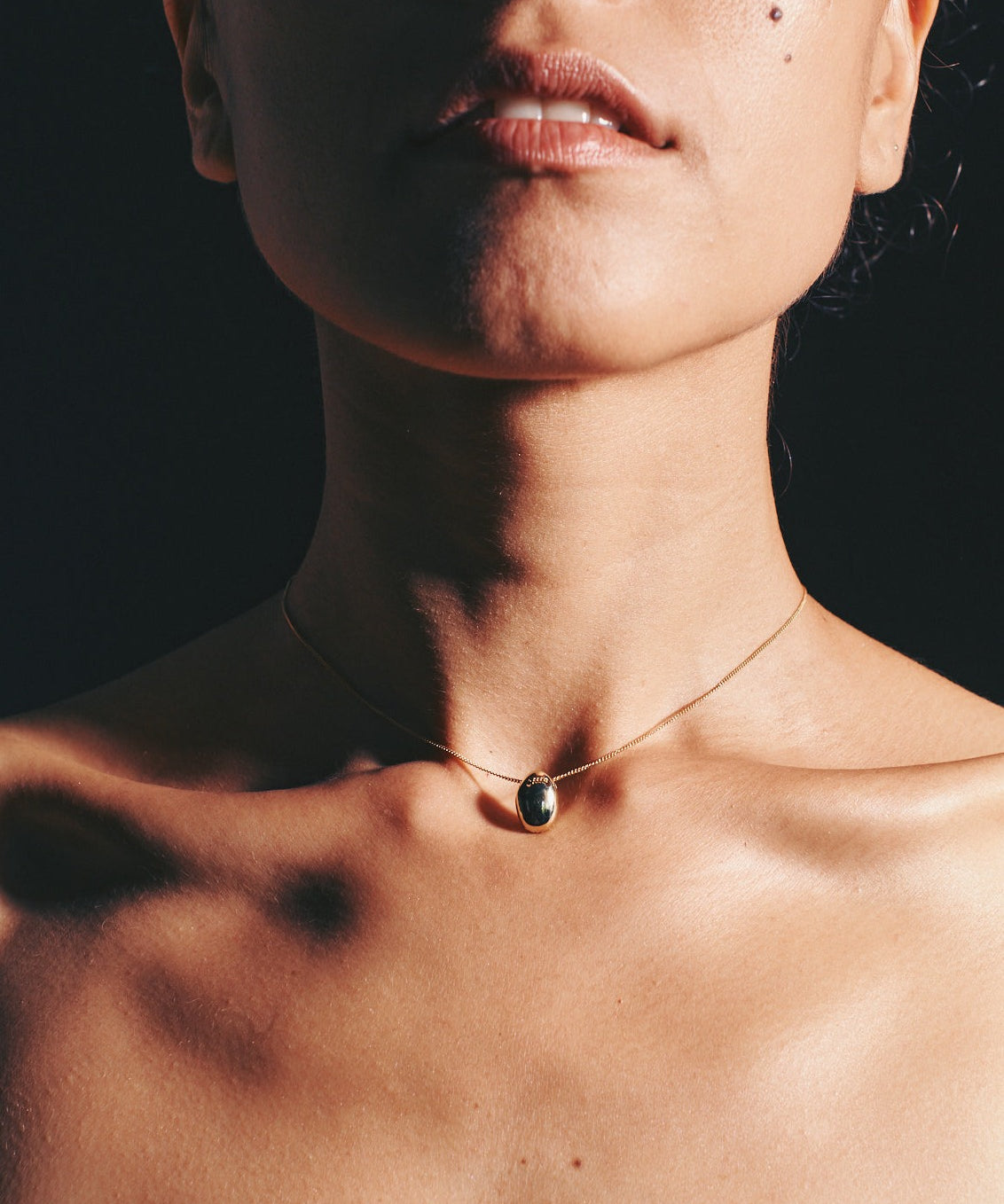 GOLD PEBBLE LOCKET - Ruby Star